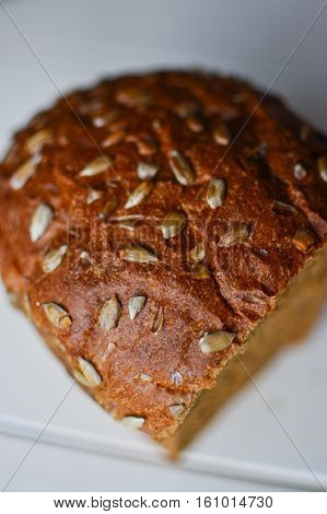 Rye bread with sunflower seeds. Black bread with flour coarse.