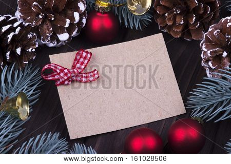 Christmas Xmas New Year Holiday Greeting Card Concept With Empty Cardboard Red Christmas Balls Bell