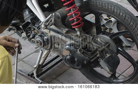 a close up dirty black motocycle tire wheel