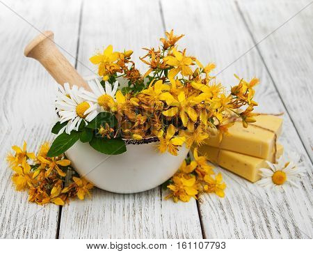 Tutsan Flowers  And Mortar With Soap