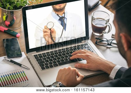 Doctor On A Computer Screen