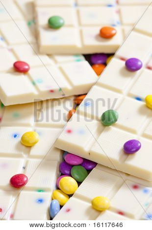 still life of white chocolate with smarties
