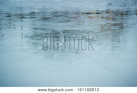 winter water freezes at low temperature and ice cover formed on the surface of bodies of water