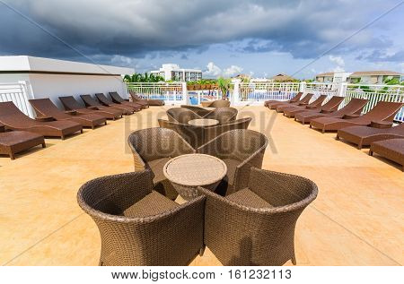 Cayo Guillermo island, Iberostar Playa Pilar hotel, Cuba, June 28, 2016, amazing gorgeous view of various modern stylish outdoor patio furniture near the swimming pool