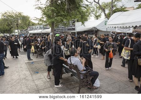 BANGKOK THAILAND - NOV 19 : crowd of mourners in Sanam Luang area while the funeral of king Bhumibol Adulyadej in Grand Palace on november 19 2016