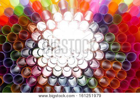 Plastic straw color. A light shone through a circular pipe. Took shape beautiful colors Take a closer focus on the details clearly.