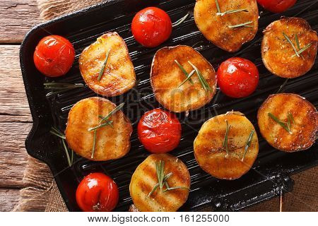 Grilled Potato Halves And Tomatoes With Herbs On The Grill. Horizontal Top View