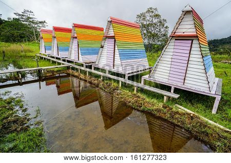 Ranau,Sabah-Dec 11,2016:Colorful huts at the Mt Kinabalu Holiday Camp at Ranau,Sabah,Borneo with background of the Mountain Kinabalu & the breathtaking expanse of the montane forest.