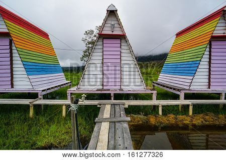 Ranau,Sabah-Dec 11,2016:Colorful huts at the Mt Kinabalu Holiday Camp at Ranau,Sabah,Borneo with background of the Mountain Kinabalu & the breathtaking expanse of the montane forest.