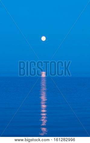 moonrise over Lake Baikal near rock Small Bell Tower, Sandy bay