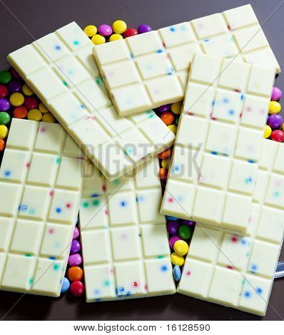 still life of white chocolate with smarties