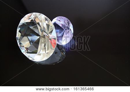 crystals similar to diamonds on the black glass