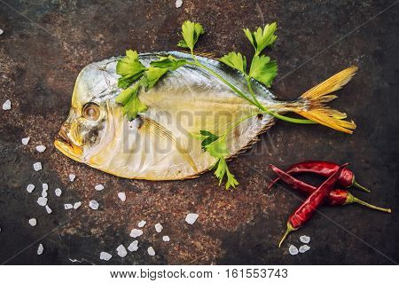 Smoked fish Vomero and spices on an table