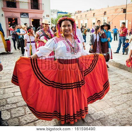 OAXACA, MEXICO-DEC 10, 2015: Beautiful lady celebrating Day of the Virgin of Guadalupe (Dia de la Virgen de Guadalupe) on Dec 10, 2015 . Oaxaca, Mexico. It is a popular Catholic feastival