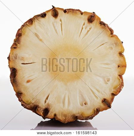 half slice of pineaaple isolated on white background