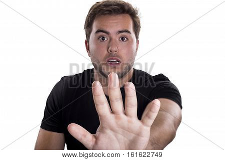 Man holding up hands as a stop gesture on a white background