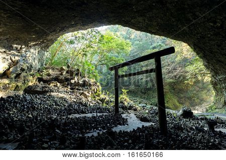 Shinto shrine gateway in the cave