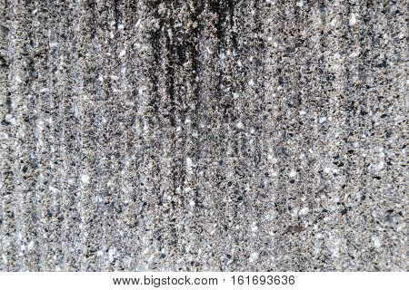 A rugged grey concrete wall with a nice texture