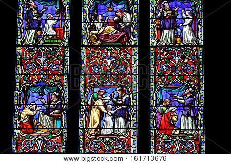 ELY, ENGLAND - JUNE 28, 2016: Interior Ely Cathedral - stained glass window. The only UK building recognized as one of the Seven Medieval Wonders of the world.