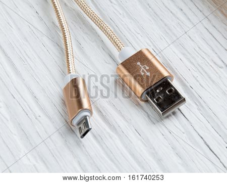 Usb Data Cablei Phone On Wooden Background.micro Usb Cable.