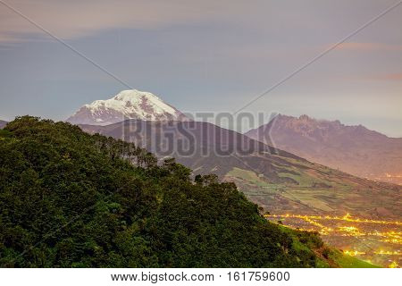 Long Exposure Of Chimborazo Volcano And Altar Volcano Illuminated By The Moonlight Ecuador South America