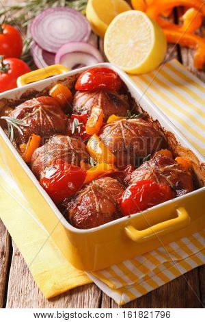 Baked Fillet Of Rabbit With Vegetables Close Up In Baking Dish And Ingredients. Vertical