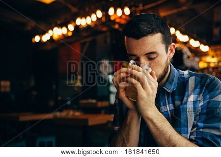 Handsome Natural Man Drinking Tea