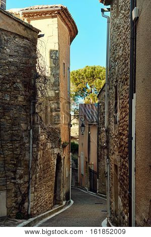 Charming narrow street of Venasque. Venasque one of the most beautiful village of France.