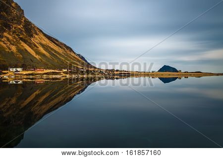 Hoven mountain reflections in Limstrandpollen Lofoten, Norway
