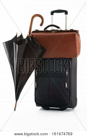 umbrella bag and suitcase on a white background