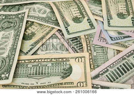 Amarican Dollars Are Scattered With Different Memorials