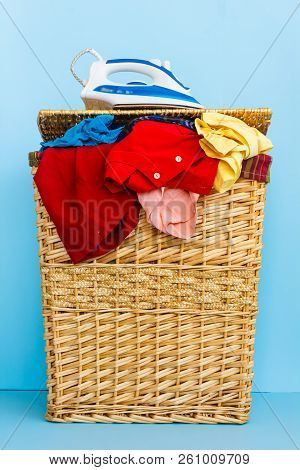 Creel Of Clothes /creel Of Clothes Brimfull Of Clothes To Be Ironed With A
Iron