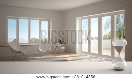 White Table Or Shelf With Crystal Hourglass Measuring The Passing Time Over Modern Living Room With 