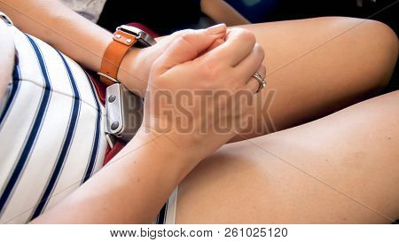 Closeup Image Of Young Woman Praying Before Airplane Taking Off