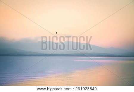 A Dreamy, Hazy Landscape Of A Mountains Close To Sunset. Sun Flase And Misty Look In Blue Tones. Mo