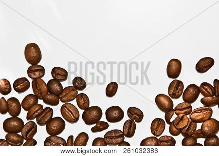 Top View Isolated Brown Aroma Coffee Seeds And Beans Background.