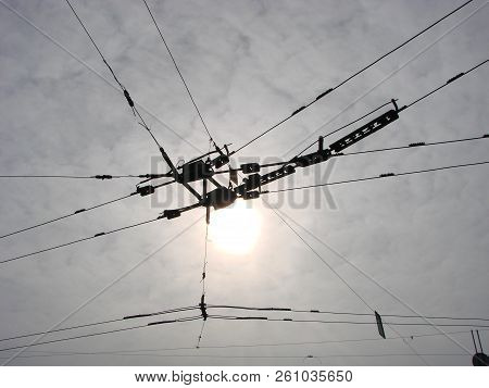 Wires Pole With Blue Sky. Electrical Wires On A Background. Electric Cables. Power Cable With Blue S