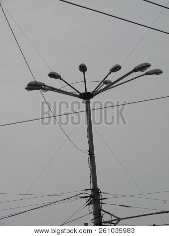 Wires Pole With Blue Sky. Electrical Wires On A Background. Electric Cables. Power Cable With Blue S