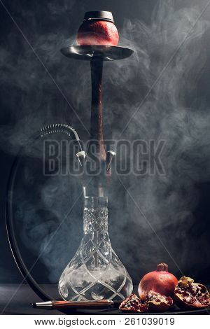 Hookah Hot Coals On Shisha Bowl With Black Background. Stylish Oriental Shisha. Garnet