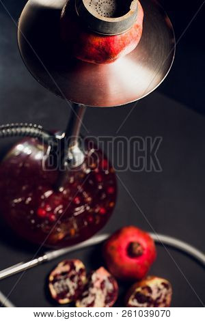 Hookah Hot Coals On Shisha Bowl With Black Background. Stylish Oriental Shisha. Garnet