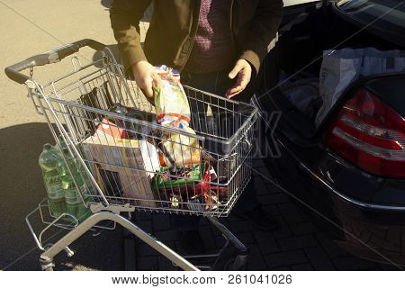 Corby, United Kingdom. October 1, 2018: Man With Shopping Carts On The Street With Food