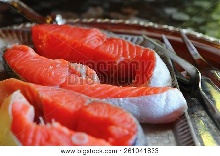 Slices Salmon Bright Colorful Fresh Pieces On Metallic Plate In The Kitchen