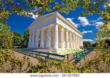 Theseus Temple In Volksgarten Park Of Vienna View Through Leaf Frame, Public Park In Capital Of Aust