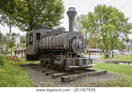 Rockport, Maine, USA - September 19, 2018: A Vulcan Steam Locomotive displayed in Rockport Marine Park is similar to the two locomotives used to haul lime from the quarry to the Rockport harbor lime kilns in the 1890s
