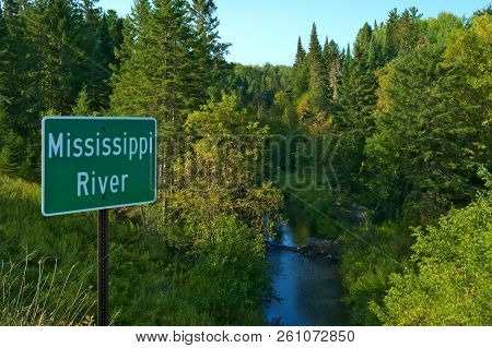 Mississippi River Flowing North Near Its Source At Itasca State Park In Minnesota. This Sign Is At O