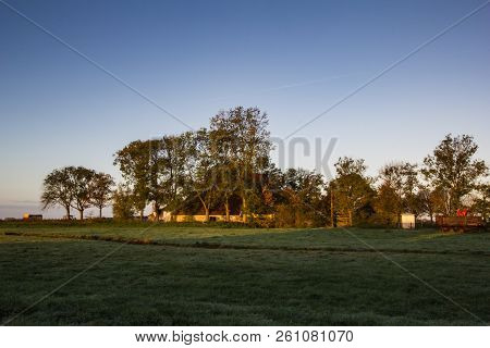 House In Frisland Province, Green  Field, Sunset