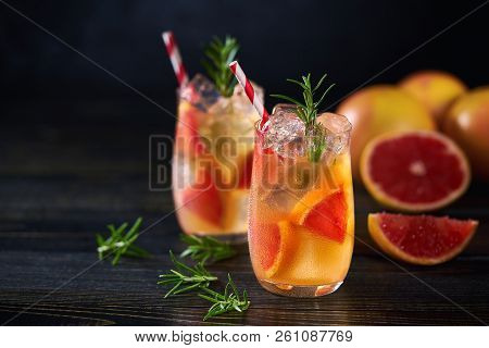 Refreshing Cocktail With Ice Grapefruit And Rosemary.