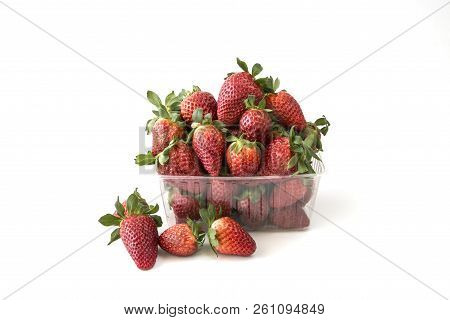 Fresh Strawberry In Shop Plastic Boxes, White Background