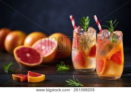 Refreshing Cocktail With Ice Grapefruit And Rosemary.