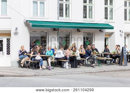 June 10, 2017 - Copenhagen, Denmark: People In A Wine Bar On Stefansgade In Norrebro District Enjoyi